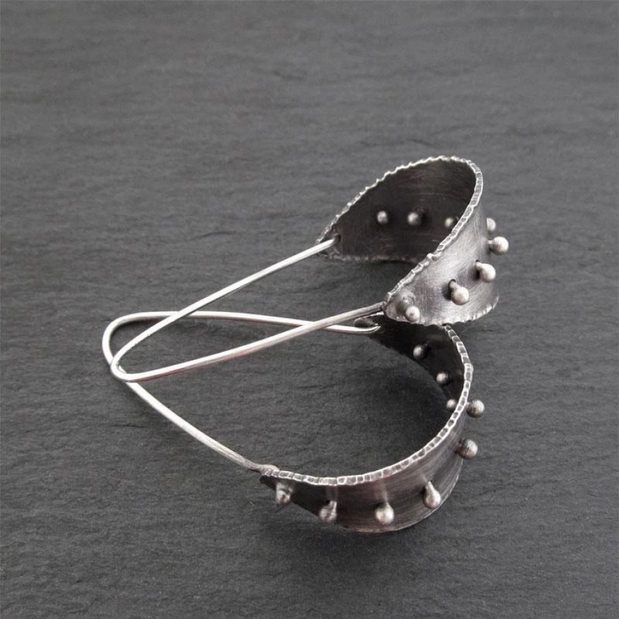 Online * Andree Chenier Silver Saddle Earrings