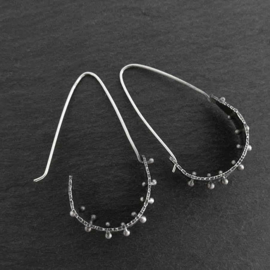 Online * Andree Chenier Silver Saddle Earrings